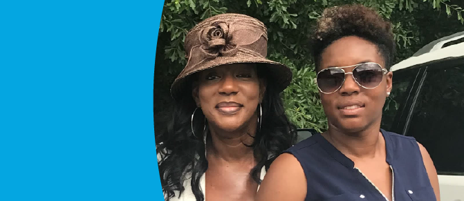 Photo of Judy Robinson with family member.