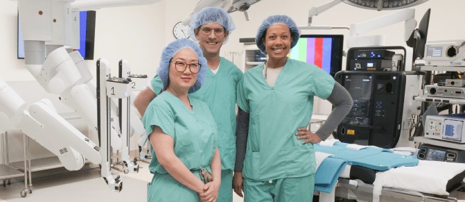 Three physicians in their operating room