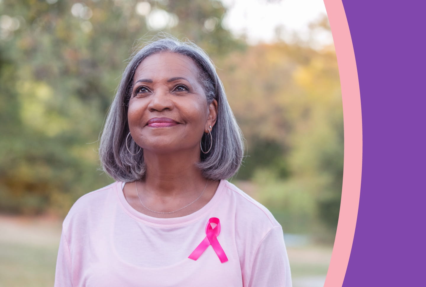 Person wearing pink ribbon