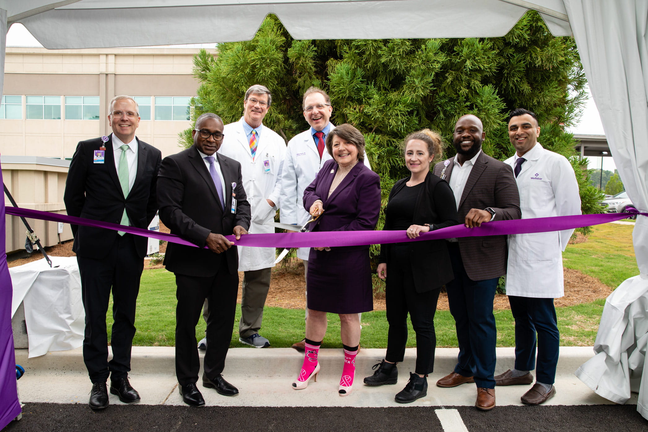 On May 23, community leaders gathered to cut the ribbon on a cancer treatment expansion Wellstar Paulding Medical Center. Pictured l-r: Don Zarkou, VP, Oncology Service Line, Wellstar Health System; Ralph Turner, SVP, Wellstar Health System, President, Wellstar Paulding Medical Center; Dr. Michael Andrews, Chief Cancer Officer, Wellstar Health System; Dr. William Thoms, Radiation Oncology Medical Director, Wellstar Paulding Medical Center; Sandy Kaecher, Post II Paulding Commissioner; Nichole Rydahl, AVP, Operations, Wellstar Paulding Medical Center; Shawn Jackson, Manager, Radiation Oncology, Wellstar Paulding Medical Center; Dr. Rakendu Shukla, Radiation Oncologist, Wellstar Paulding Medical Center.