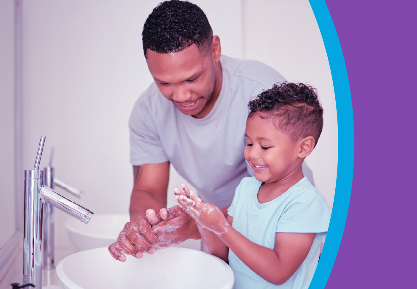 Parent and child washing hands