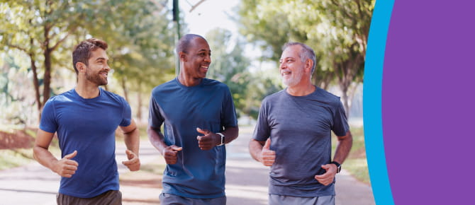 Group of men of different ages jogging together.