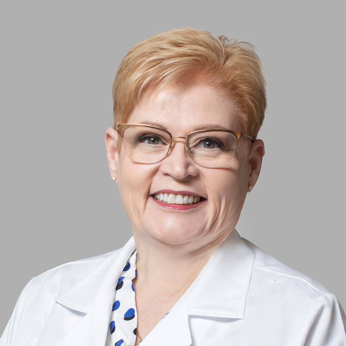 A friendly headshot of Nancy Page, RN