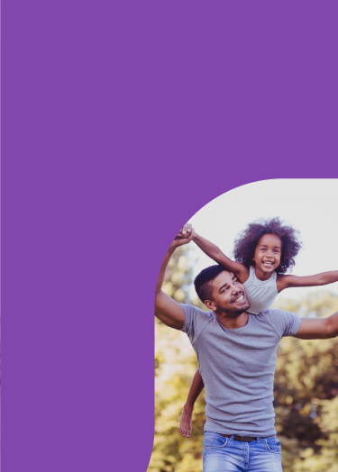 Dad holding holding daughter up on his shoulders with the Wellstar logo on the bottom